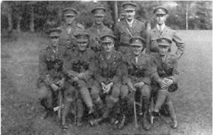 Aldington with fellow officers, 1918. He is in the back row, second from the right